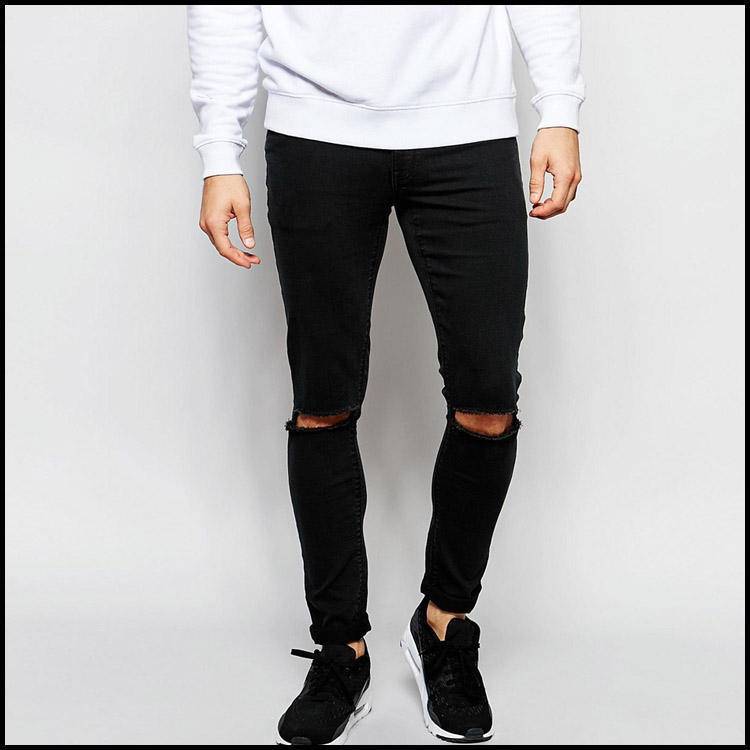Трендовые джинсы с дырками на коленках: харизма и небрежность в деталях