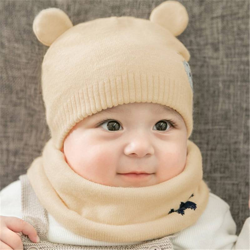Зимние шапки для новорожденных (86 фото) — теплая вязаная шапка-шлем и с мысиком, размер, esli и шапка-зайка
