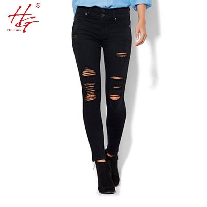 Черные джинсы с дырками на коленях, выбираем самые модные